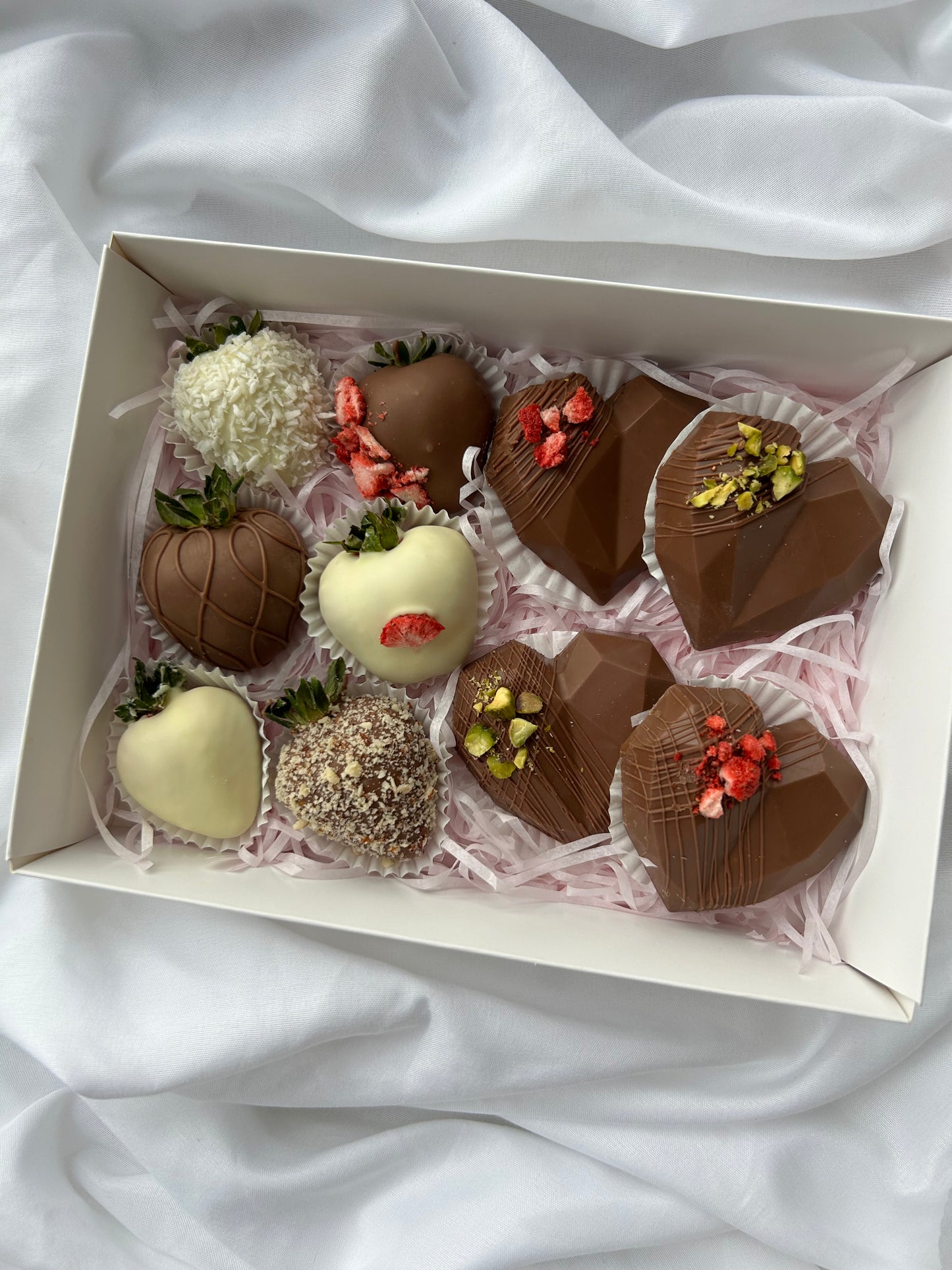 heart shaped chocolates and chocolate dipped strawberries