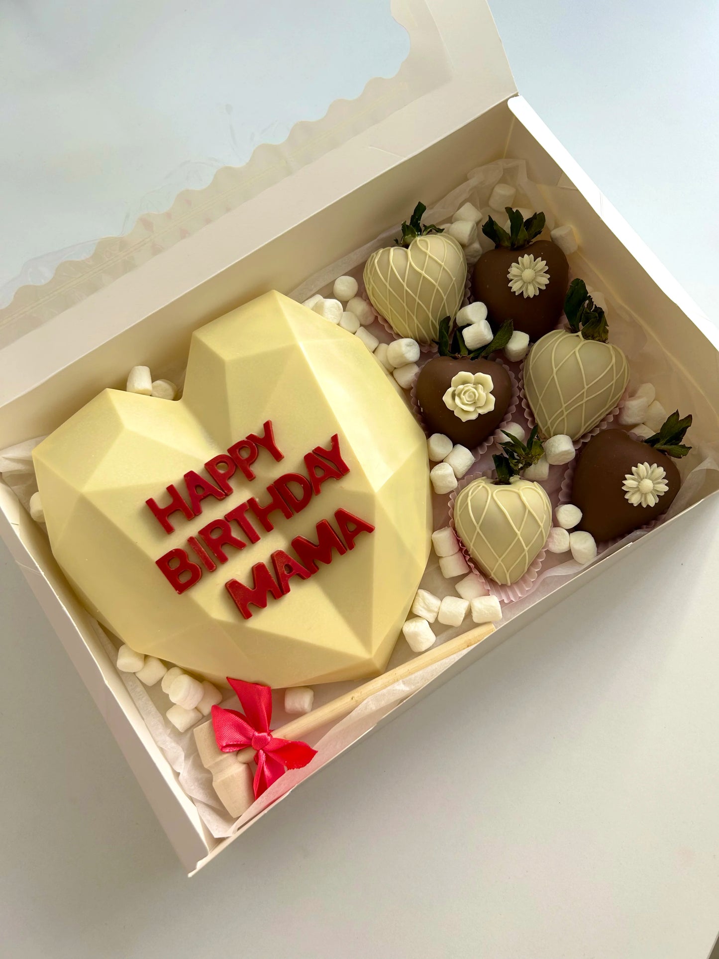 Mother birthday gift with smash heart and chocolate covered strawberries