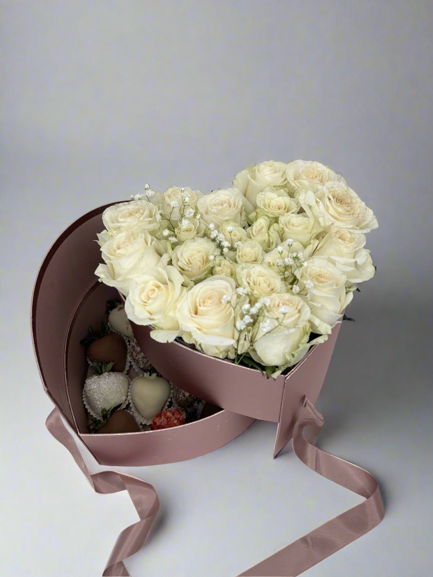 Pink two drawer heart shaped box with white roses and dipped strawberries 